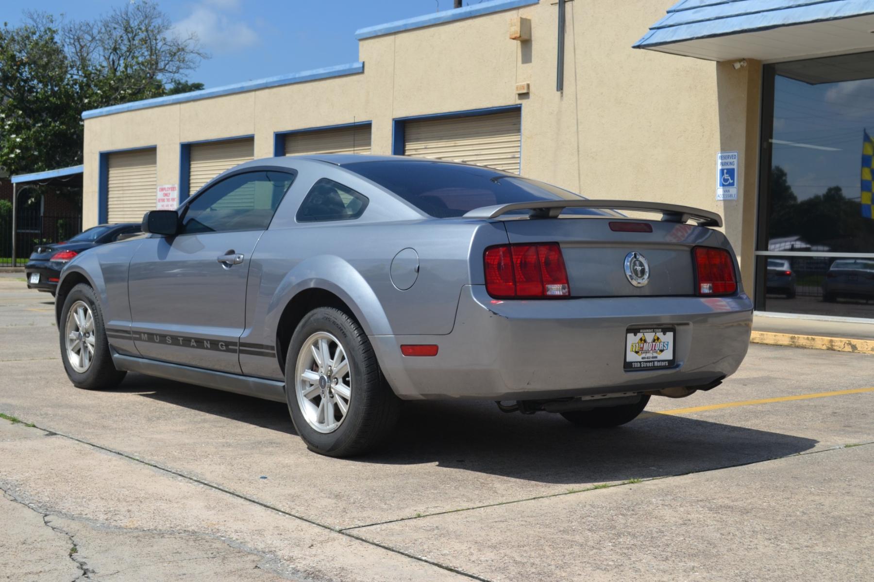2006 Tungsten Grey Metall /Light Graphite Cloth Ford Mustang V6 Deluxe Coupe (1ZVFT80N665) with an 4.0L V6 SOHC 12V engine, located at 1355 North 11th Street, Beaumont, 77702, (409) 832-0006, 30.094290, -94.130096 - Photo #2